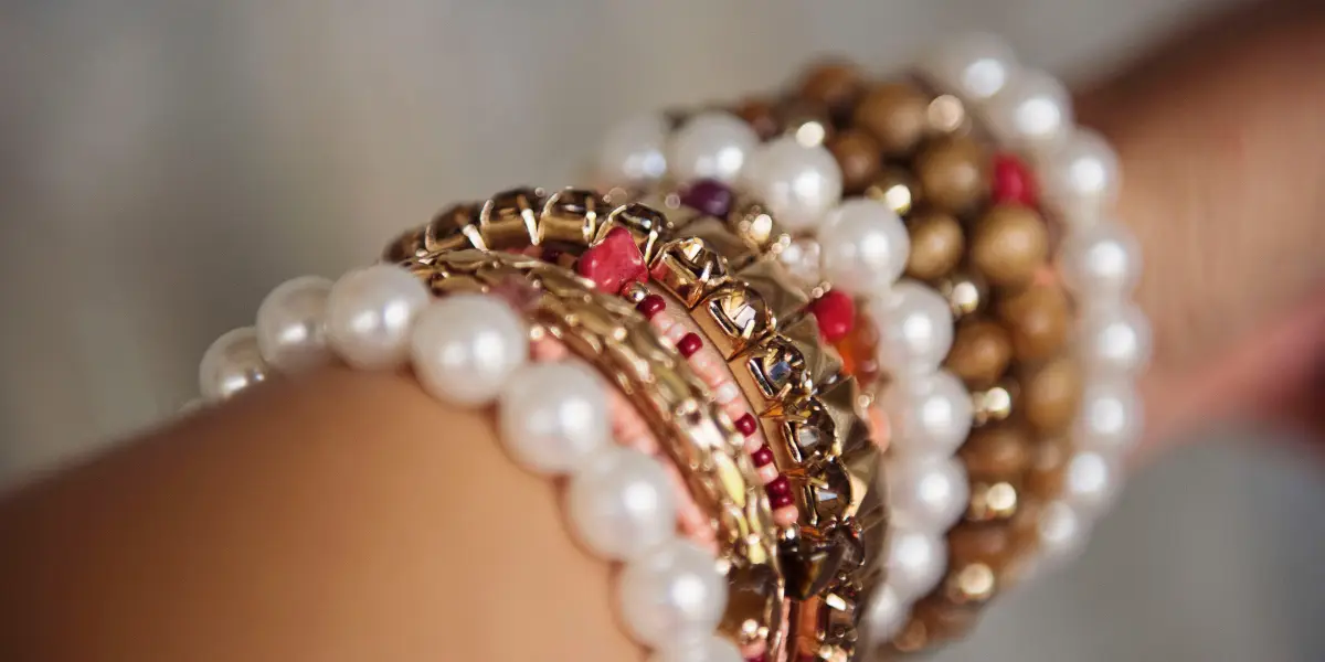 Assortment of Bracelets on Woman's Arm